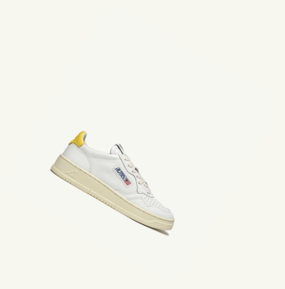 Women's Autry Medalist Low Sneakers White Yellow | CA-S486015